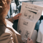 Woman reading the New York Times 