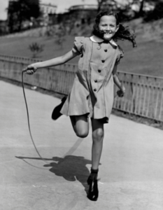 Girl jumping rope in the 40s 