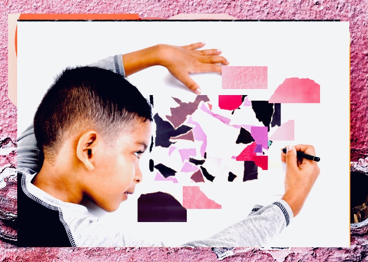 Young Boy Creating A Collage