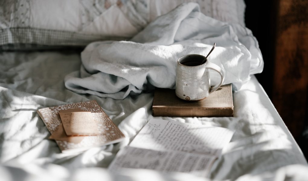 Books, coffee and sheets