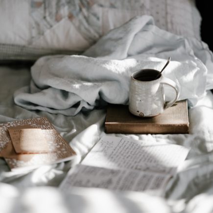 Books, coffee and sheets