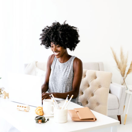 Black Woman Writing A Book